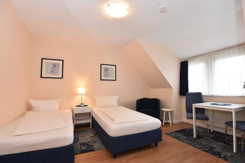 Imagen de la habitación del Hotel Bremer Apartmenthotel Superior. Foto 10