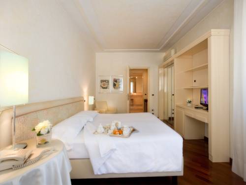 Imagen de la habitación del Hotel Brescia. Foto 3