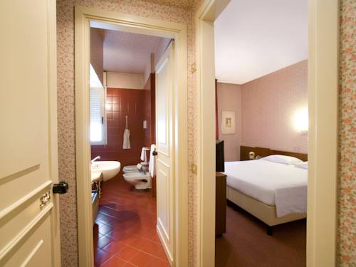 Imagen de la habitación del Hotel Brescia. Foto 4