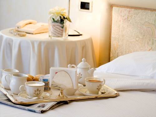 Imagen de la habitación del Hotel Brescia. Foto 7