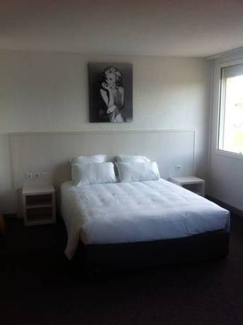 Imagen de la habitación del Hotel Bress Sa&ocirc;ne. Foto 11