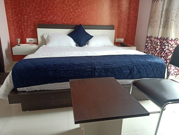 Imagen de la habitación del Hotel Brew Berry Residency. Foto 12