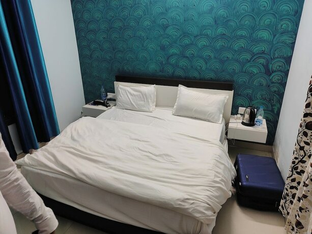 Imagen de la habitación del Hotel Brew Berry Residency. Foto 13