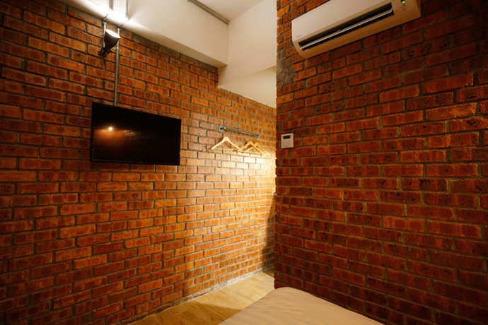 Imagen de la habitación del Hotel Brick Box. Foto 7