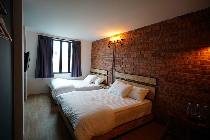 Imagen de la habitación del Hotel Brick Box. Foto 12
