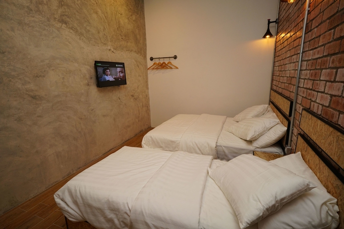 Imagen de la habitación del Hotel Brick Box. Foto 14