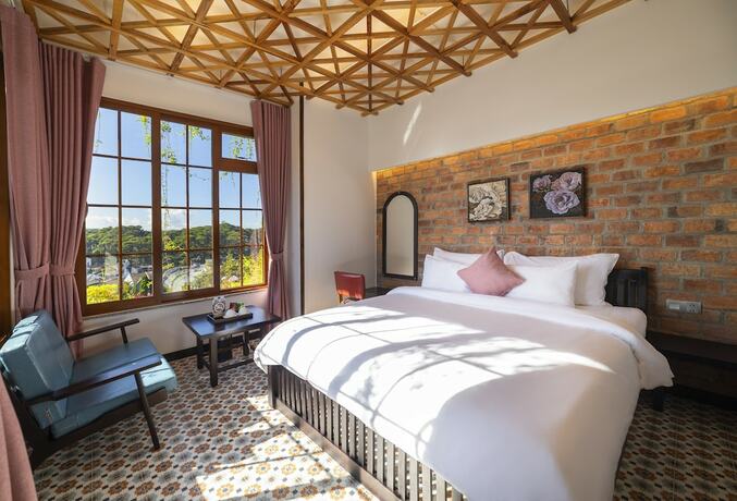 Imagen de la habitación del Hotel Brick House Dalat. Foto 11