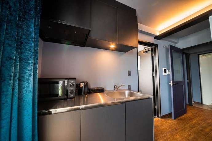 Imagen de la habitación del Hotel Brick, Naha. Foto 4