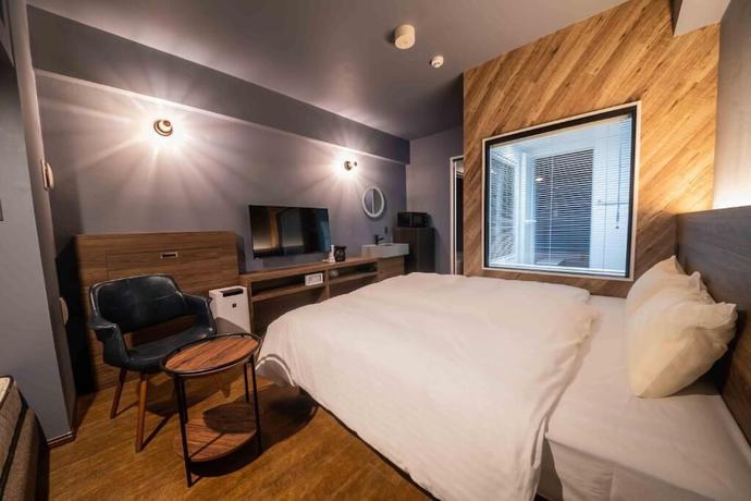 Imagen de la habitación del Hotel Brick, Naha. Foto 15
