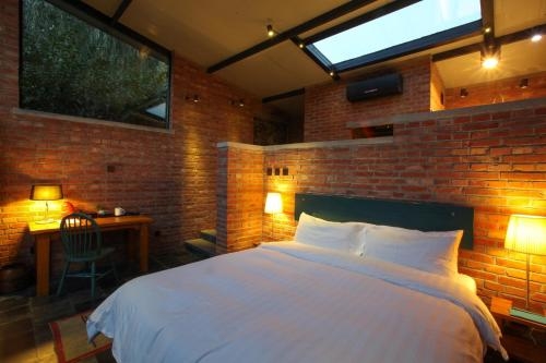 Imagen de la habitación del Hotel Brickyard Retreat At Mutianyu Great Wall. Foto 7