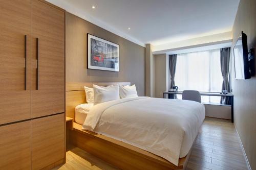 Imagen de la habitación del Hotel Bridal Tea House Panyu Guangzhou. Foto 5