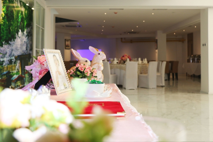 Imagen del bar/restaurante del Hotel Bridal Tea House Yantai Zhifu. Foto 6