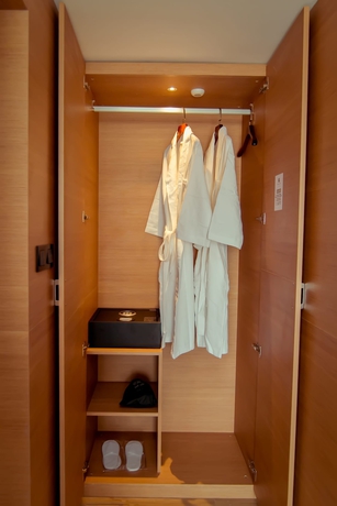 Imagen de la habitación del Hotel Bridal Tea House Yantai Zhifu. Foto 12