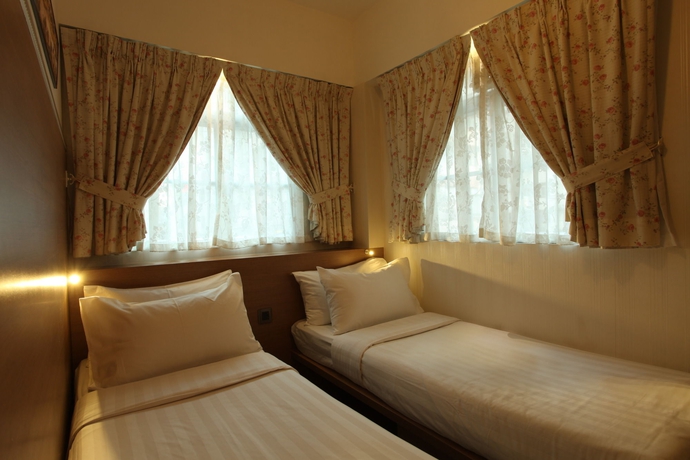 Imagen de la habitación del Hotel Bridal Tea House Yau Ma Tei Arthur Street. Foto 8