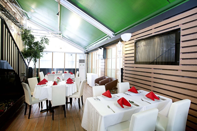 Imagen del bar/restaurante del Hotel Bridal Tea House Yau Ma Tei Arthur Street. Foto 4