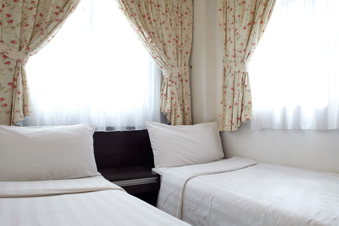 Imagen de la habitación del Hotel Bridal Tea House Yau Ma Tei Arthur Street. Foto 9