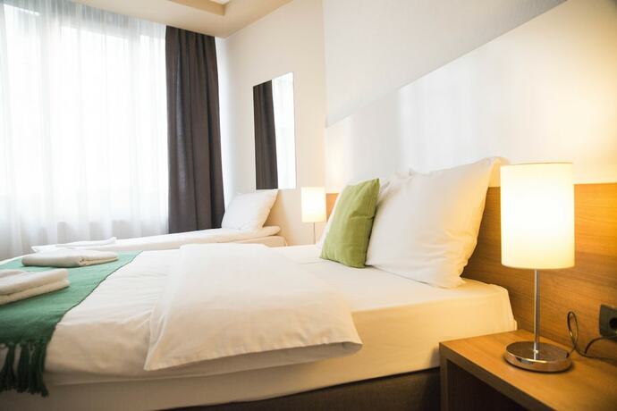 Imagen de la habitación del Hotel Bridge Apart Belgrade. Foto 17