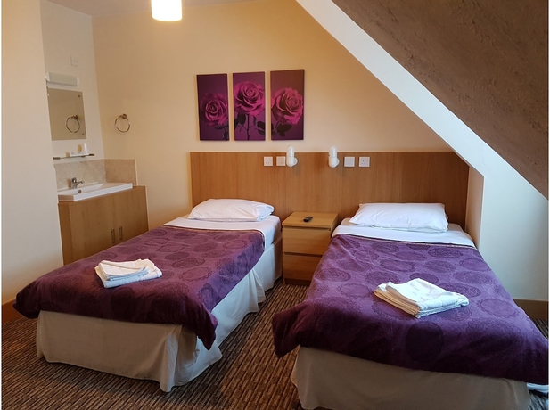 Imagen de la habitación del Hotel Bridge Guest House. Foto 9