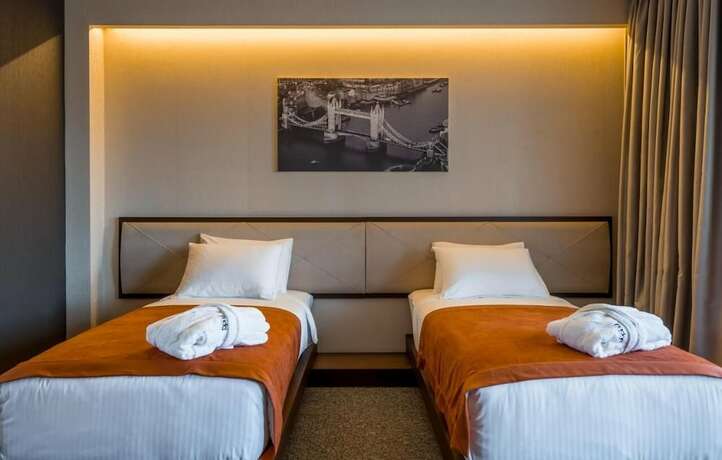 Imagen de la habitación del Hotel Bridge, Tbilisi. Foto 19