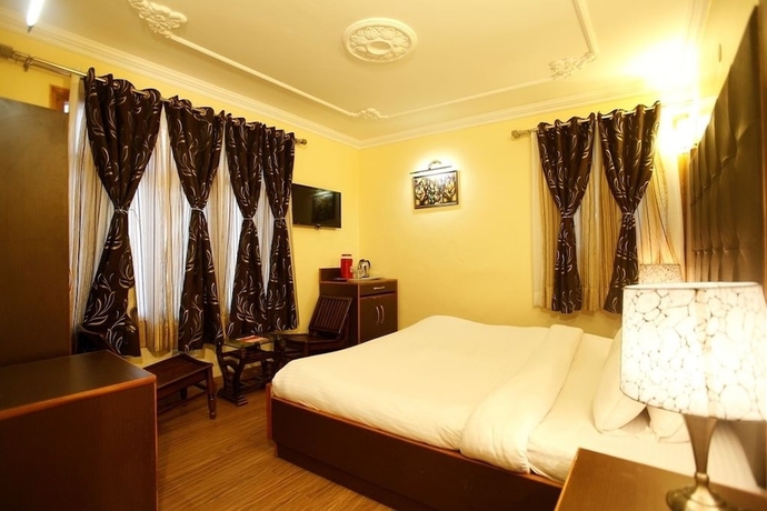 Imagen de la habitación del Hotel Bridge View Regency. Foto 8