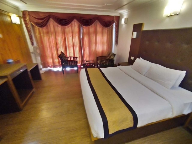 Imagen de la habitación del Hotel Bridge View Regency. Foto 13