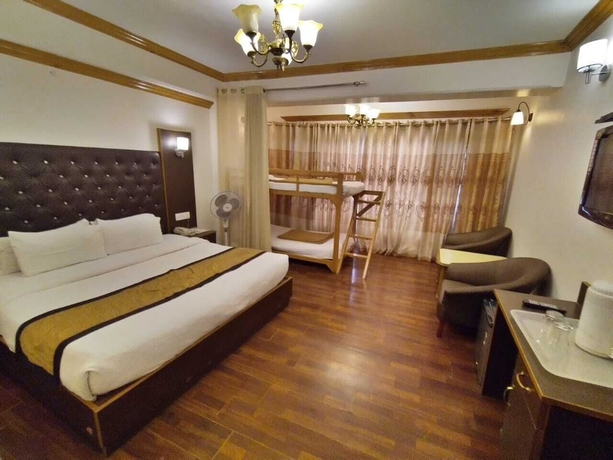 Imagen de la habitación del Hotel Bridge View Regency. Foto 17