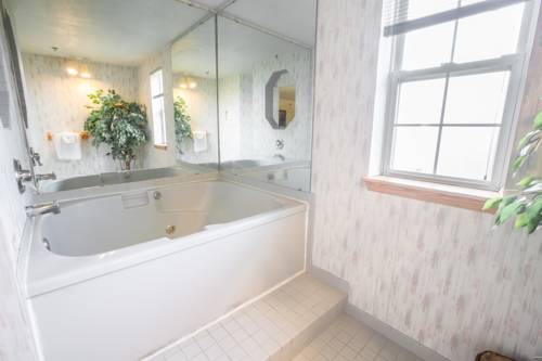 Imagen de la habitación del Hotel Bridgeway Inn and Suites Portland Airport. Foto 3