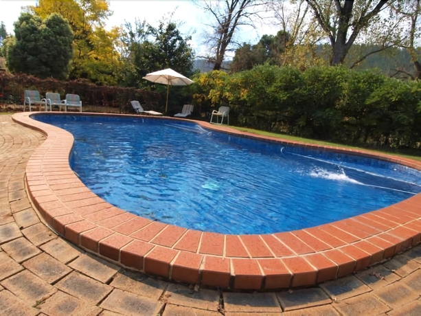 Imagen de la piscina del Hotel Bright Highland Valley Cottages. Foto 17