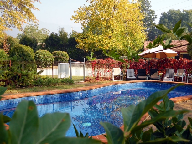 Imagen de la piscina del Hotel Bright Highland Valley Cottages. Foto 19