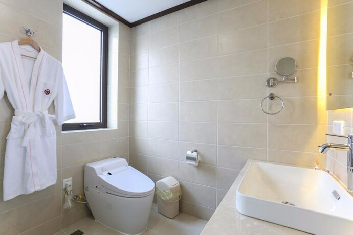 Imagen de la habitación del Hotel Bright House Shanghai Disney Branch. Foto 26