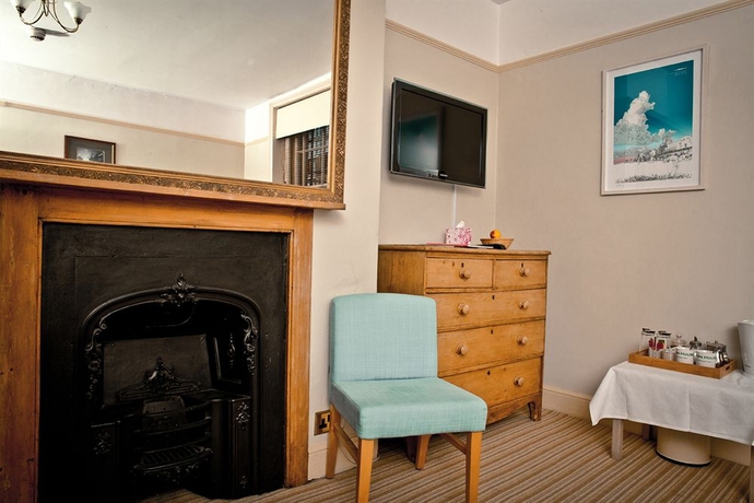 Imagen de la habitación del Hotel Brighton House. Foto 7