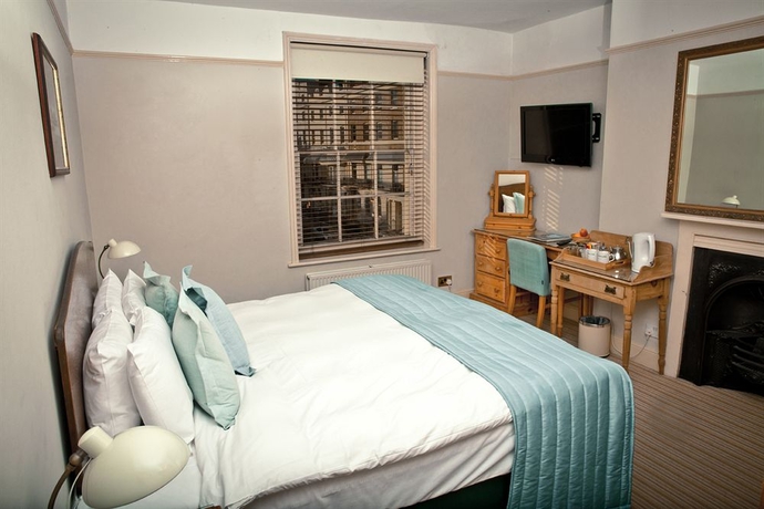 Imagen de la habitación del Hotel Brighton House. Foto 14