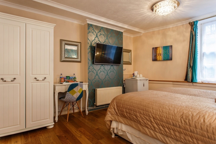 Imagen de la habitación del Hotel Brighton Surf Guest House. Foto 13