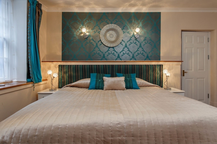 Imagen de la habitación del Hotel Brighton Surf Guest House. Foto 14