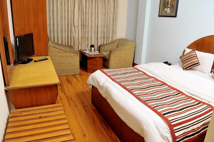 Imagen de la habitación del Hotel Brihaspati. Foto 10