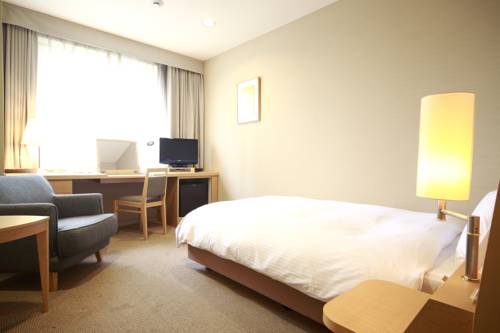 Imagen de la habitación del Hotel Brillante Musashino. Foto 1