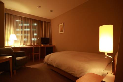 Imagen de la habitación del Hotel Brillante Musashino. Foto 5