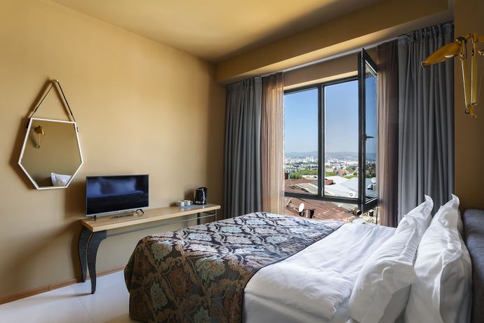 Imagen de la habitación del Hotel Brim, Tbilisi. Foto 9