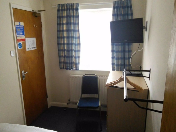 Imagen de la habitación del Hotel Brimar Guest House. Foto 14