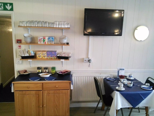 Imagen del bar/restaurante del Hotel Brimar Guest House. Foto 6