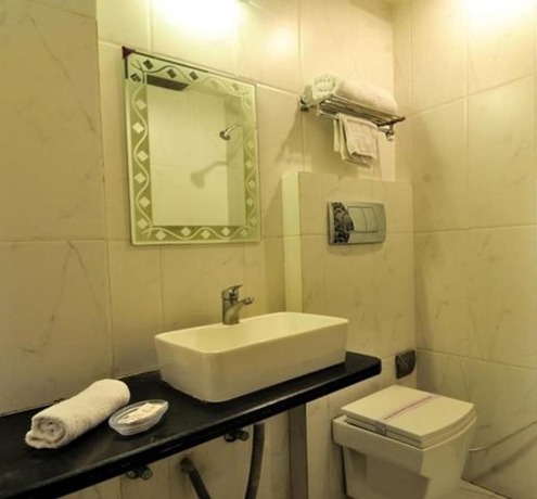 Imagen de la habitación del Hotel Brinjals. Foto 17