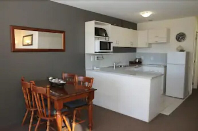 Imagen de la habitación del Hotel Brinkley Resort. Foto 19