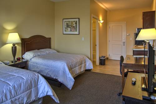 Imagen de la habitación del Hotel Brinton & Suites. Foto 3