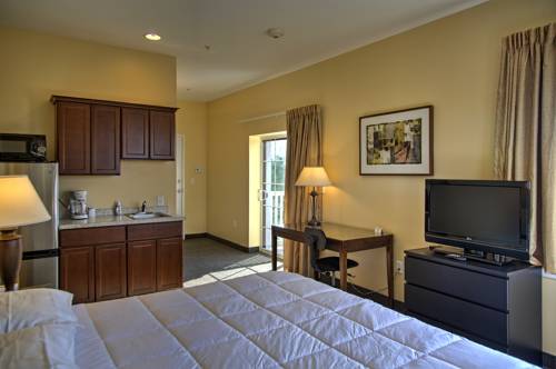 Imagen de la habitación del Hotel Brinton & Suites. Foto 5