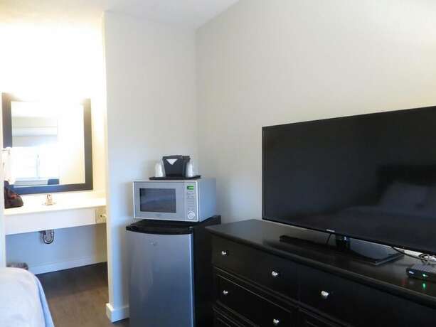 Imagen de la habitación del Hotel Brio Beach Inn. Foto 18