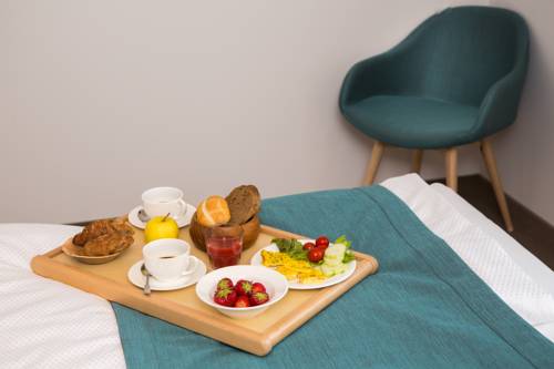 Imagen de la habitación del Hotel Brione Green Resort. Foto 7