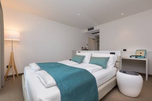 Imagen de la habitación del Hotel Brione Green Resort. Foto 8