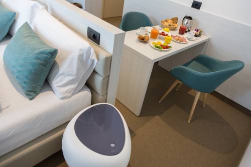 Imagen de la habitación del Hotel Brione Green Resort. Foto 10