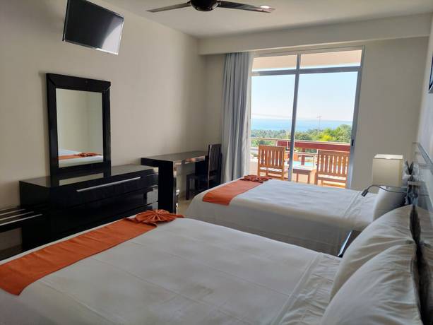 Imagen de la habitación del Hotel Brisa Color Esmeralda. Foto 8