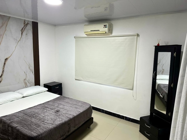 Imagen de la habitación del Hotel Brisas Del Mar Suite. Foto 8